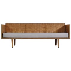 Hans J. Wegner 1950s Danish Modern Daybed in Oak and Rattan "GE7" Made at GETAMA