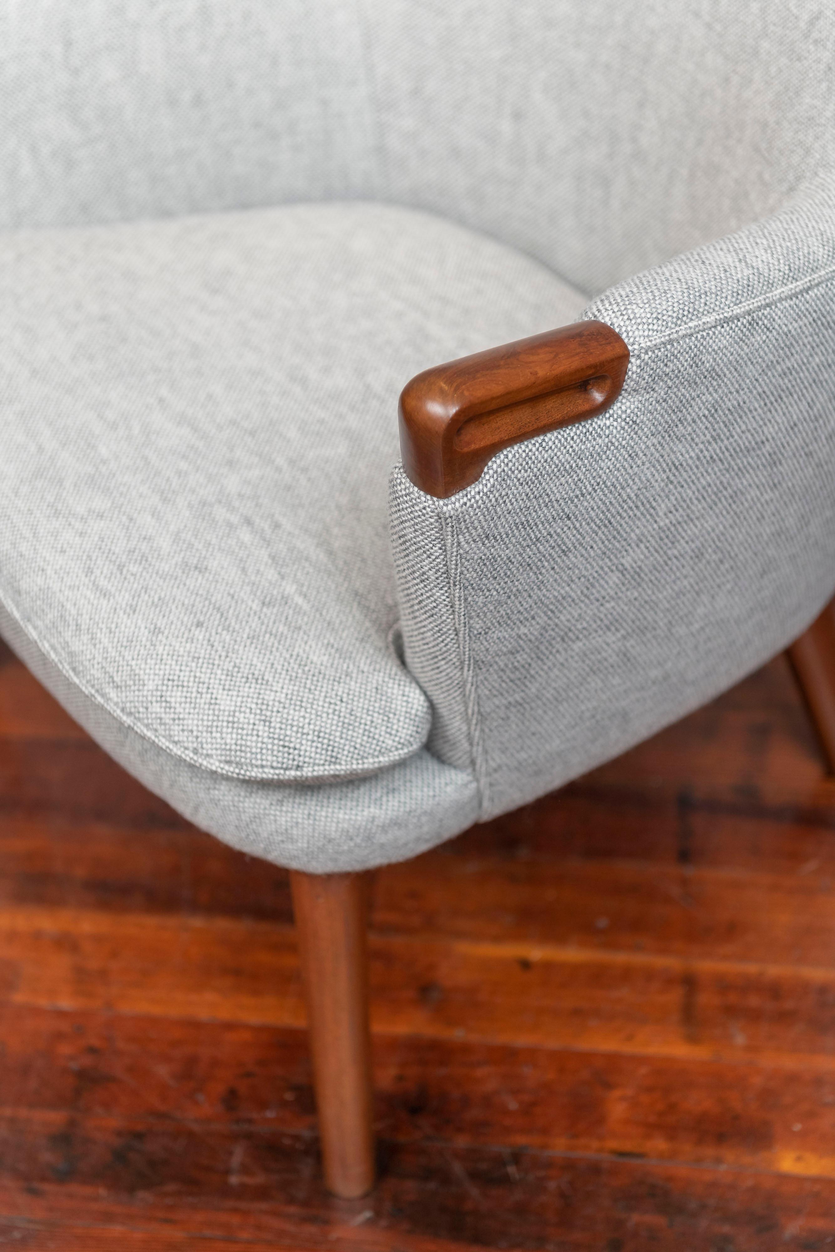 Hans J. Wegner design lounge chair, Model AP-20 for AP Stolen Denmark. Rare model by the master of Danish Modern design furniture. Newly refinished teak arms and legs with new Maharam wool upholstery. Very comfy and satisfying to sit in for