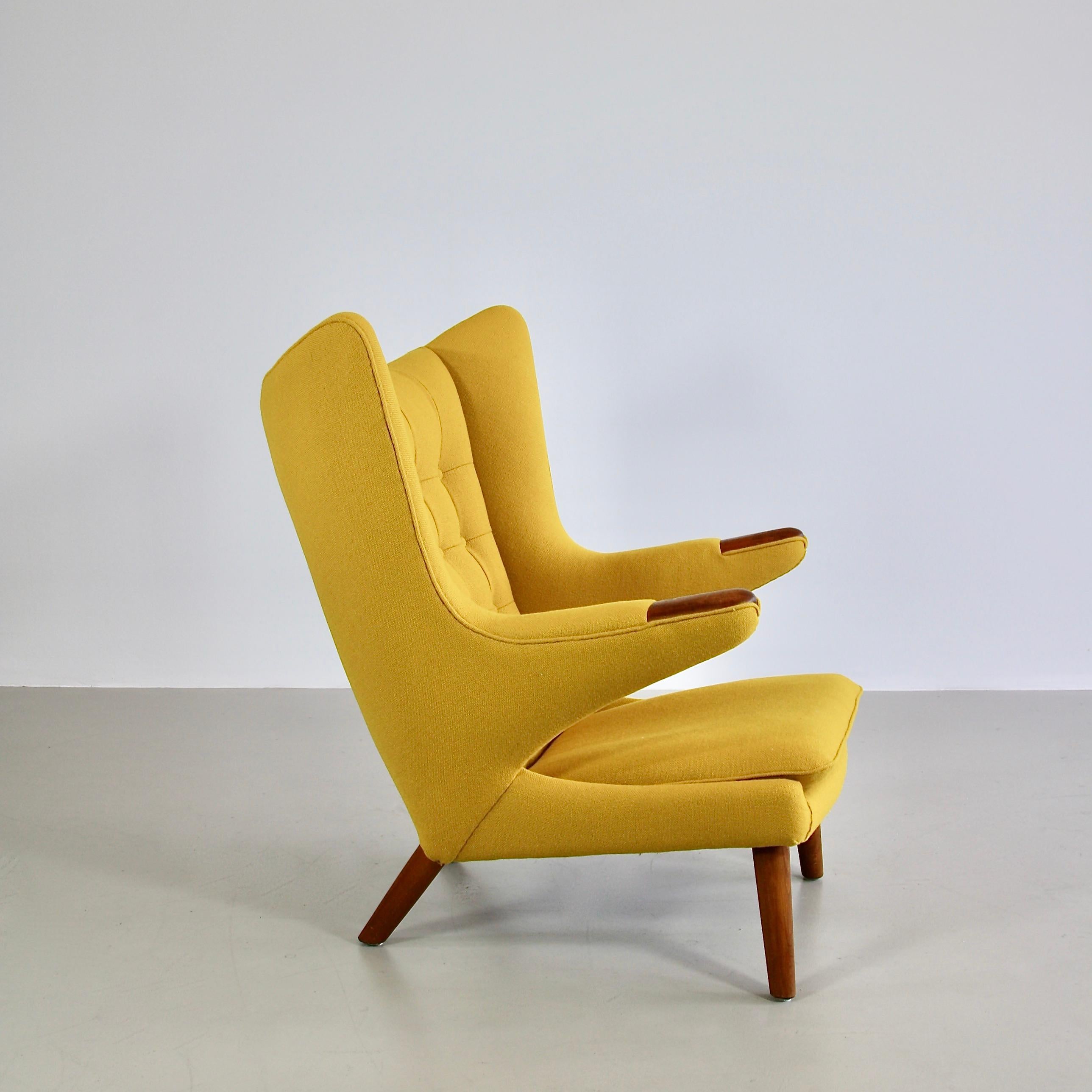 The Bamsestol (bear chair), known as the PAPA BEAR lounge chair designed by Hans J. Wegner. Denmark, A.P. Stolen, 1951.

Original edition. Solid wooden construction with oak paws and new yellow Kvadrat upholstery. A very good vintage chair with