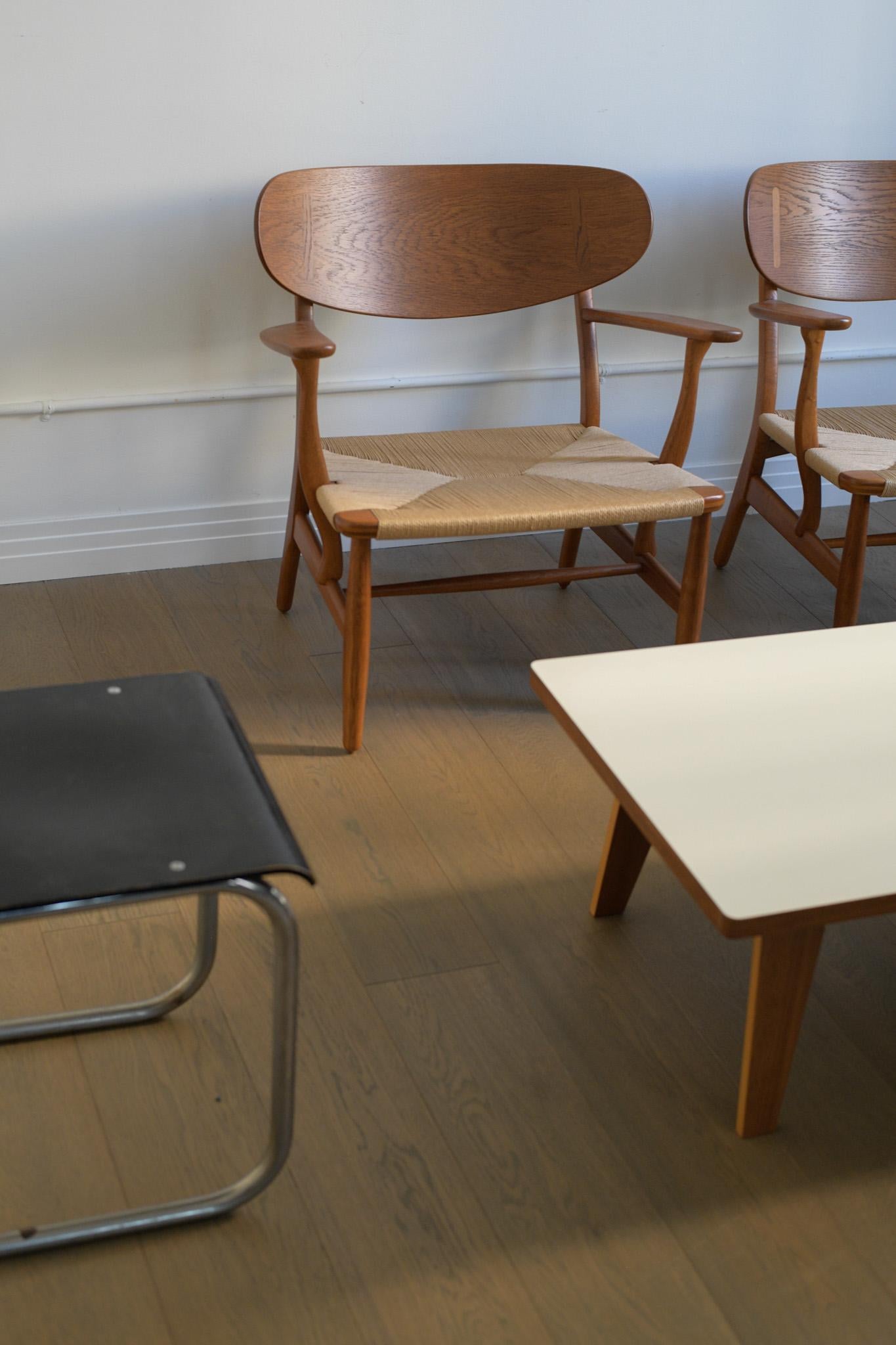 20th Century Hans J. Wegner CH 22 lounge chairs For Sale