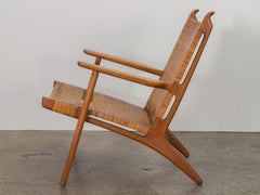 Hans J. Wegner CH-27 Oak Lounge Chair with Woven Rattan Seat