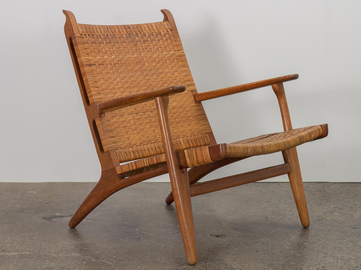 Scandinavian Modern Hans J. Wegner CH-27 Oak Lounge Chair with Woven Rattan Seat