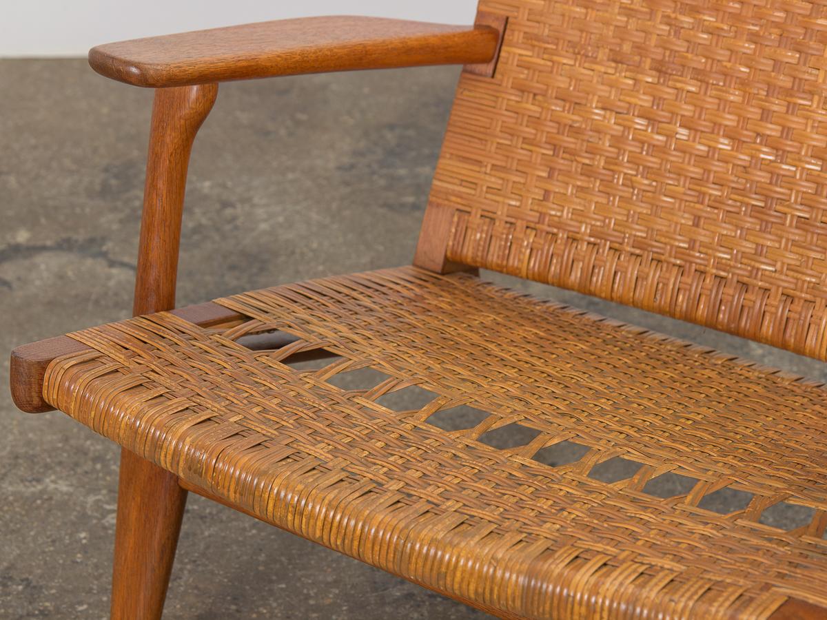 20th Century Hans J. Wegner CH-27 Oak Lounge Chair with Woven Rattan Seat