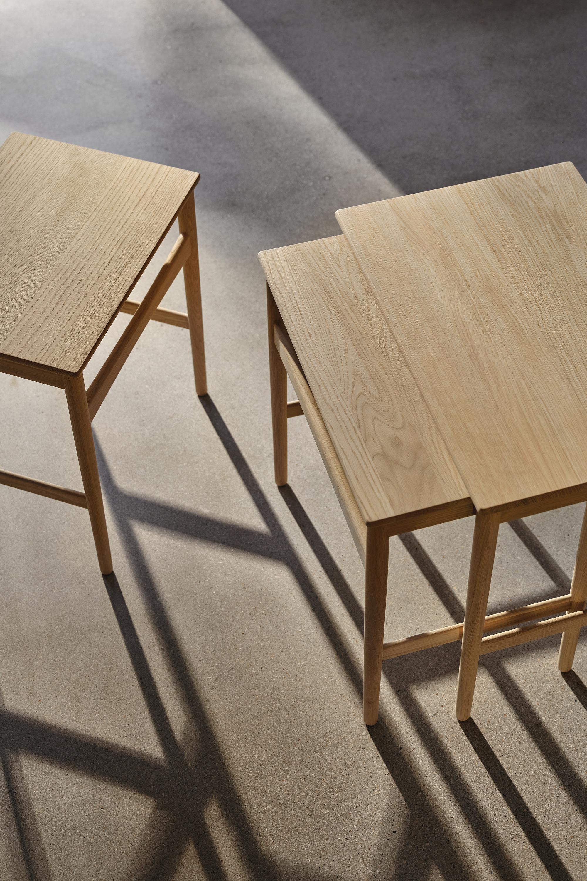 Hans J. Wegner 'CH004' Nesting Tables in Oak White Oil for Carl Hansen & Son.

The story of Danish Modern begins in 1908 when Carl Hansen opened his first workshop. His firm commitment to beauty, comfort, refinement, and craftsmanship is evident in