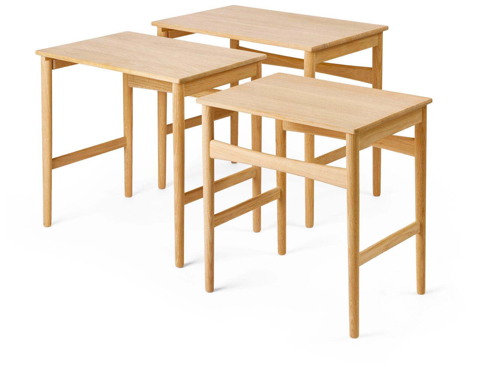 Hans J. Wegner was known for designing exceptionally simple and functional items of furniture that enhanced any room through their harmonious and aesthetic dimensions and materials. The Nesting Tables are no exception. The three tables are graduated