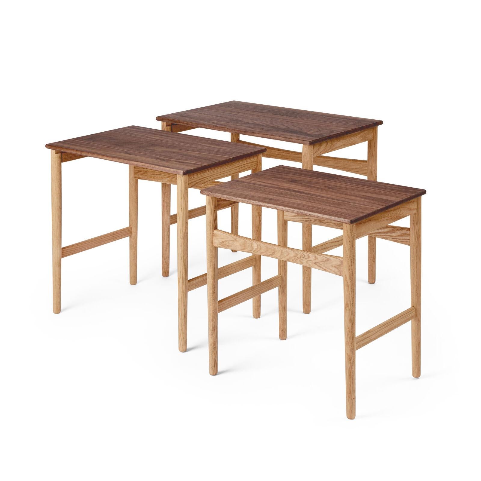Hans J. Wegner was known for designing exceptionally simple and functional items of furniture that enhanced any room through their harmonious and aesthetic dimensions and materials. The Nesting Tables are no exception. The three tables are graduated