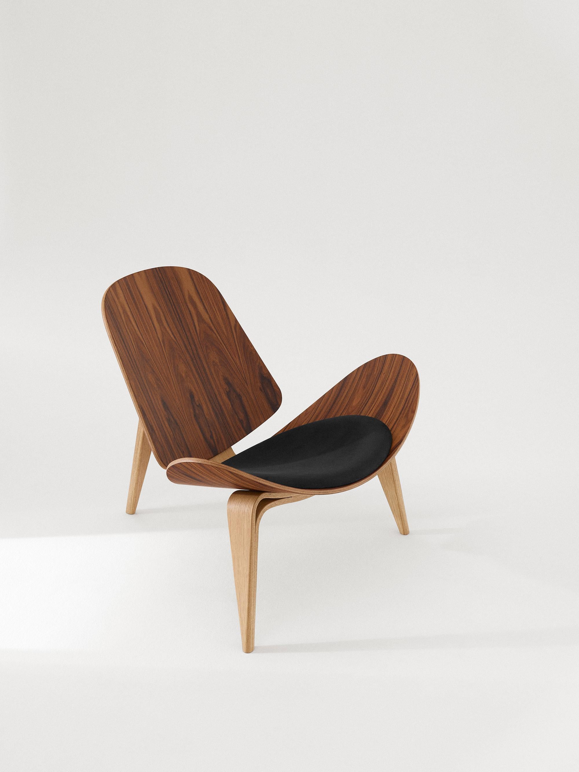 Hans J. Wegner 'CH07 Shell' 60th Anniversary Lounge Chair in Leather Upholstery for Carl Hansen & Son.

The story of Danish Modern begins in 1908 when Carl Hansen opened his first workshop. His firm commitment to beauty, comfort, refinement, and