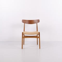 Hans J. Wegner CH23 Dining Chairs with Teak Backrest and Woven Seat by Carl Hans