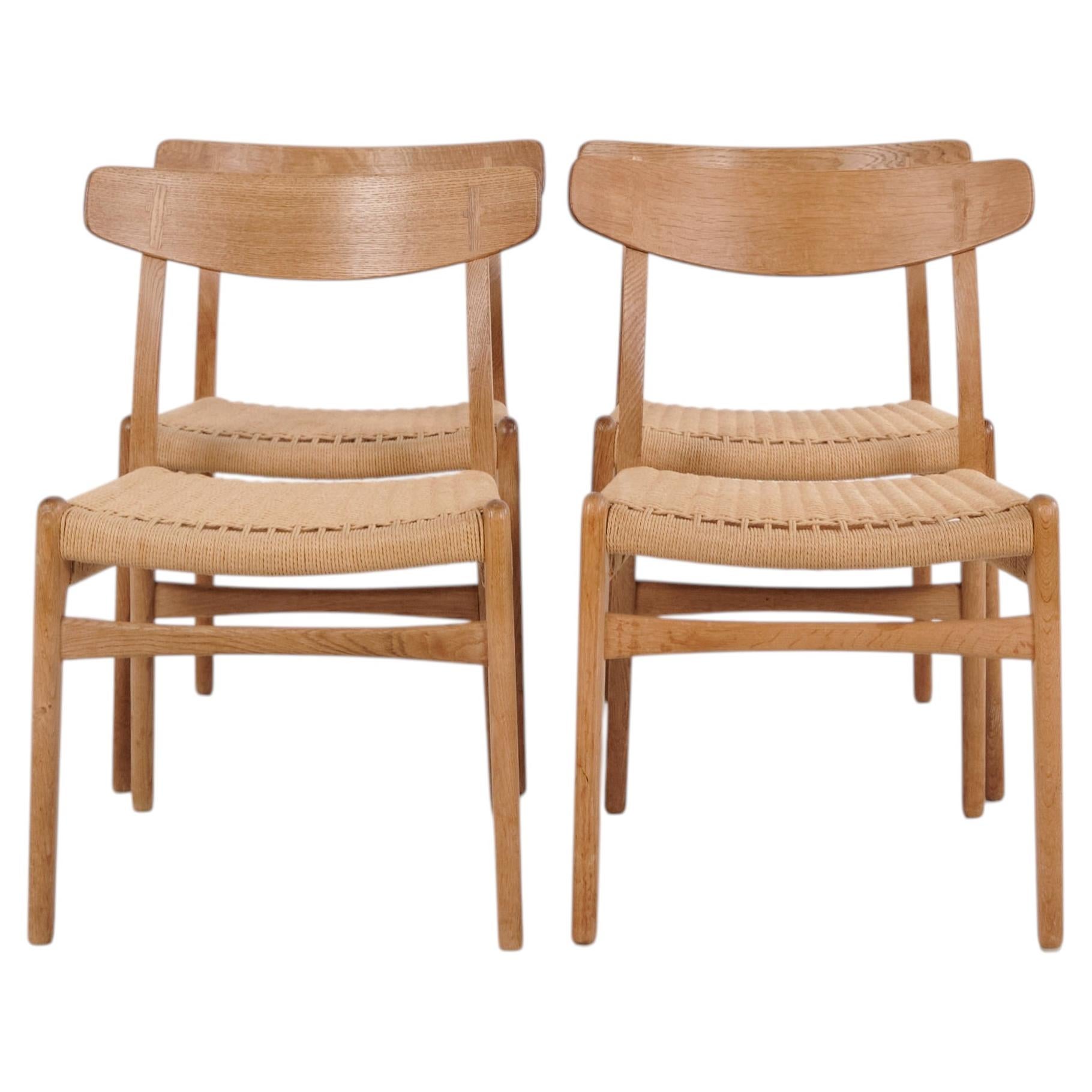 Hans J. Wegner CH23 Oak Dining Chairs with Woven Seats by Carl Hansen & Søn 196 For Sale