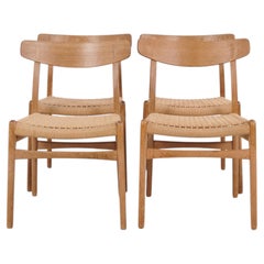 Sillas de comedor Hans J. Wegner CH23 de roble con asientos trenzados, de Carl Hansen & Søn 196