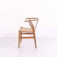 Sedie da pranzo Hans J. Wegner CH24 in rovere con sedute intrecciate di Carl Hansen & Søn