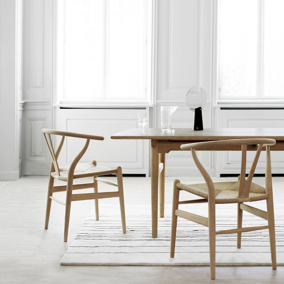 Hans J. Wegner 'CH24 Wishbone' chair in oak & soap for Carl Hansen & Son

The story of Danish Modern begins in 1908 when Carl Hansen opened his first workshop. His firm commitment to beauty, comfort, refinement, and craftsmanship is evident in