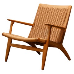 Chaise longue CH25 de Hans J. Wegner en chêne et cordon en papier pour Carl Hansen & Son