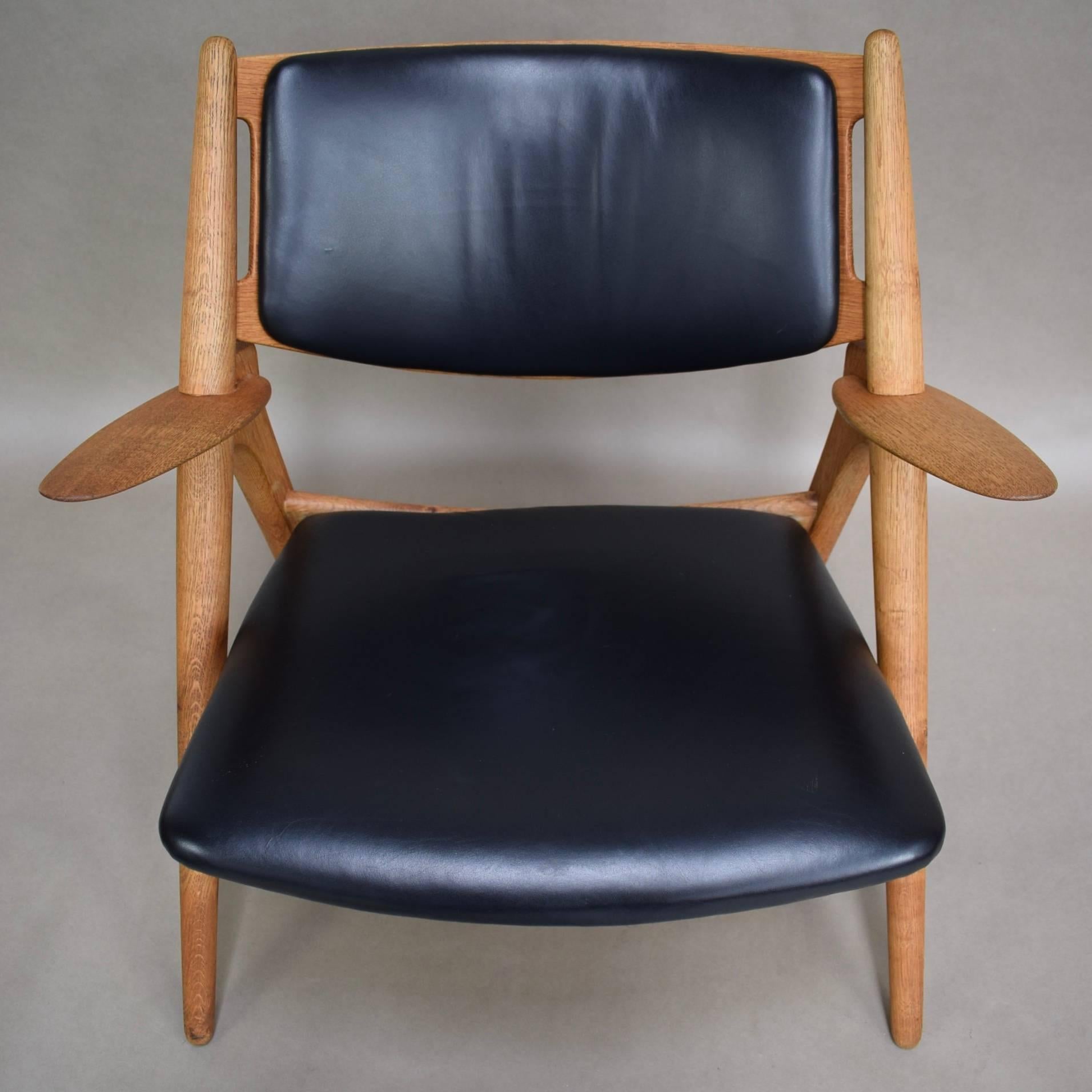 Hans J. Wegner CH28 Sawbuck Lounge Chair, Denmark, circa 1950 2
