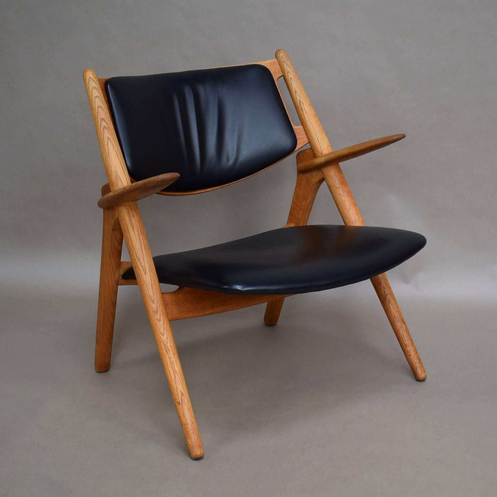 CH28 Sawbuck lounge chair by Hans J. Wegner for Carl Hansen and Son – Denmark.

Manufacturer: Carl Hansen and Son

Designer: Hans J. Wegner

Country: Denmark

Model: CH-28 Sawbuck lounge chair

Material: Teak / oak / black leather

Design period: