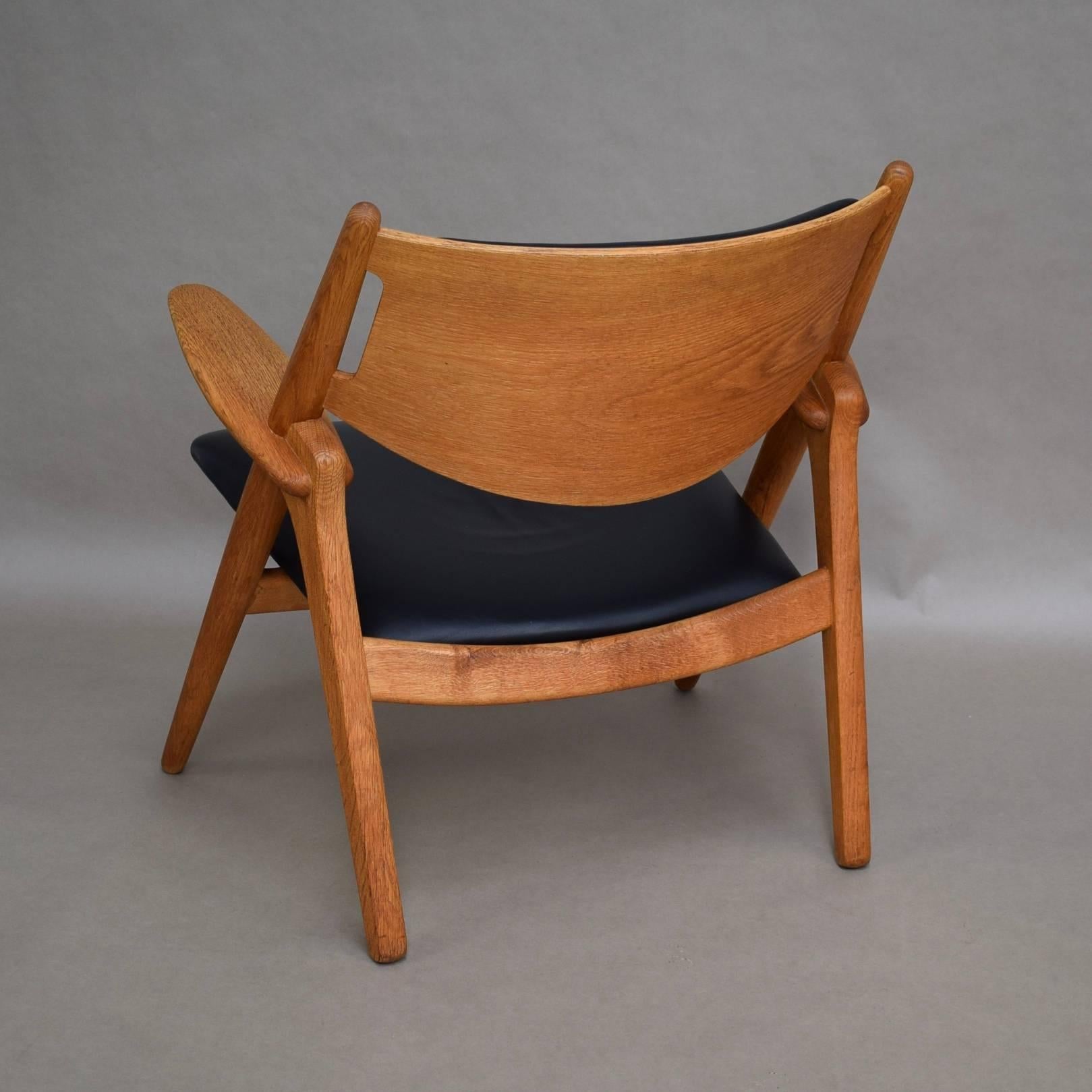Scandinavian Modern Hans J. Wegner CH28 Sawbuck Lounge Chair, Denmark, circa 1950