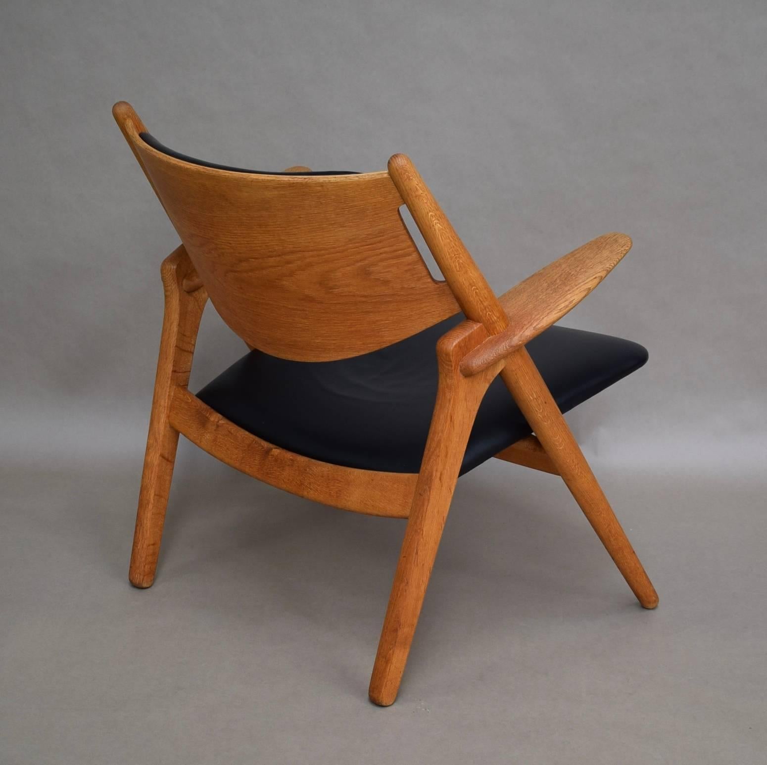 Danish Hans J. Wegner CH28 Sawbuck Lounge Chair, Denmark, circa 1950
