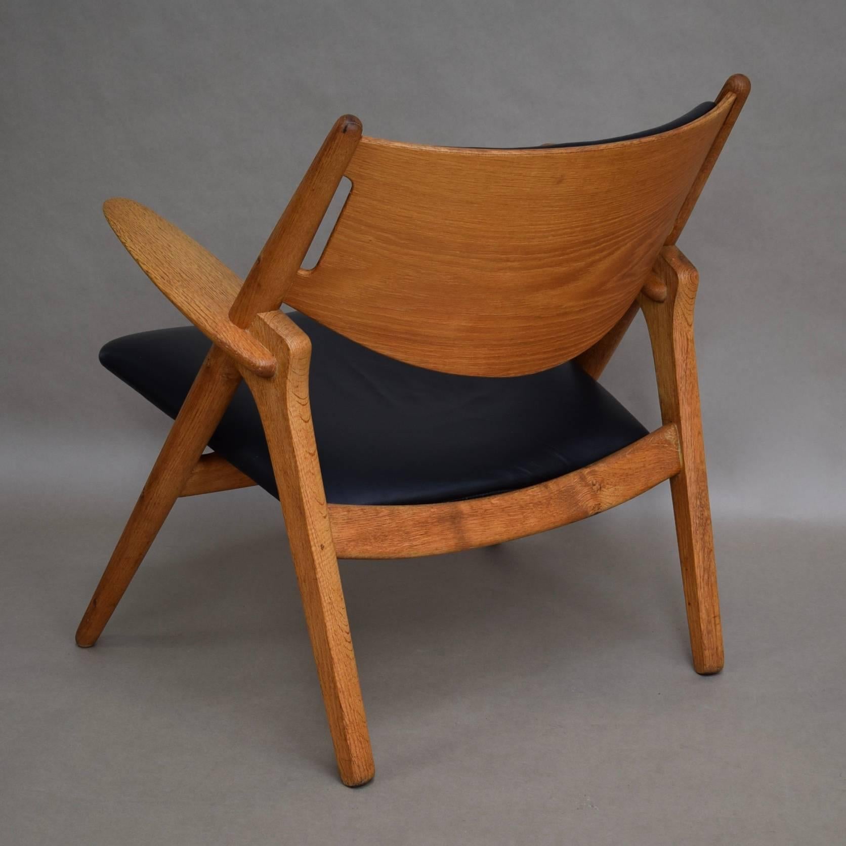 Mid-20th Century Hans J. Wegner CH28 Sawbuck Lounge Chair, Denmark, circa 1950