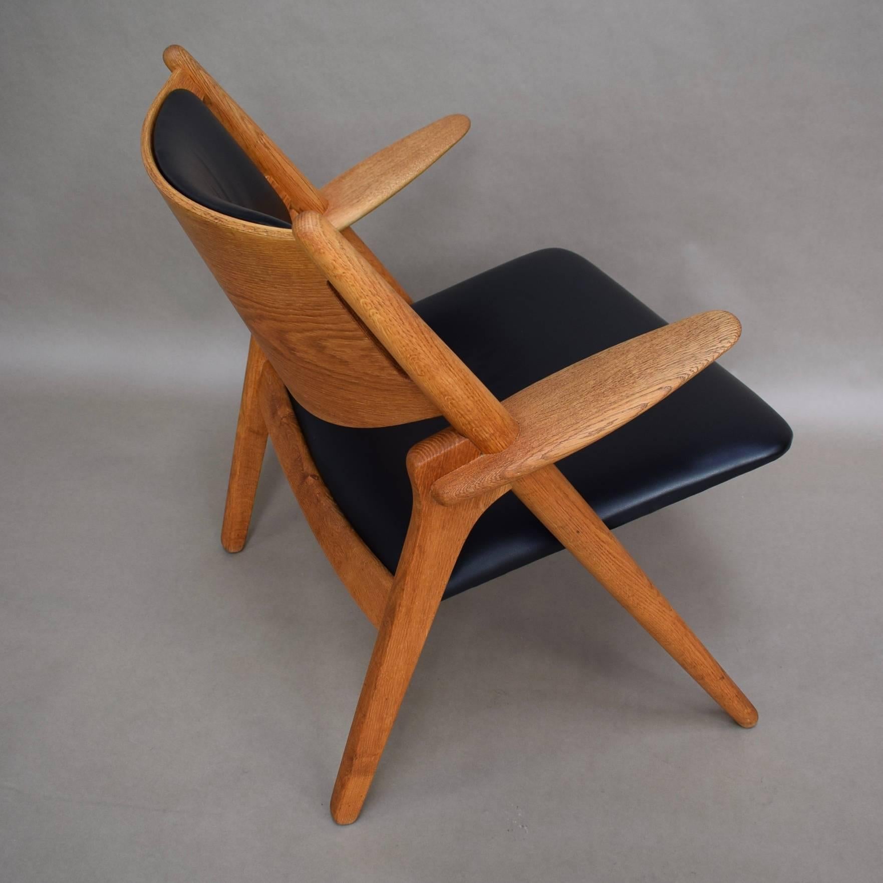 Leather Hans J. Wegner CH28 Sawbuck Lounge Chair, Denmark, circa 1950