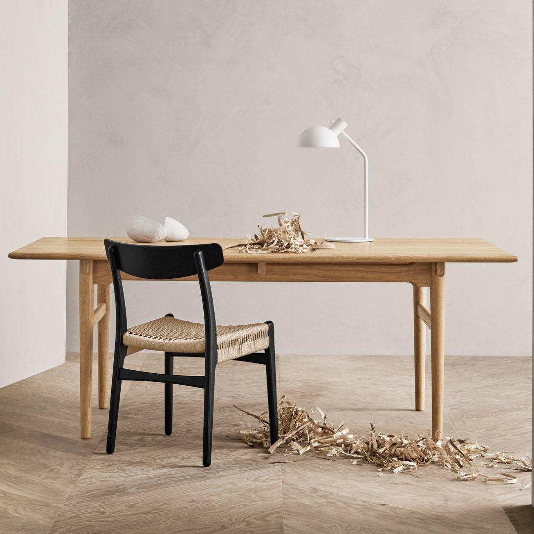 Hans J. Wegner 'CH327' dining table in oak and oil for Carl Hansen & Son

The story of Danish Modern begins in 1908 when Carl Hansen opened his first workshop. His firm commitment to beauty, comfort, refinement, and craftsmanship is evident in