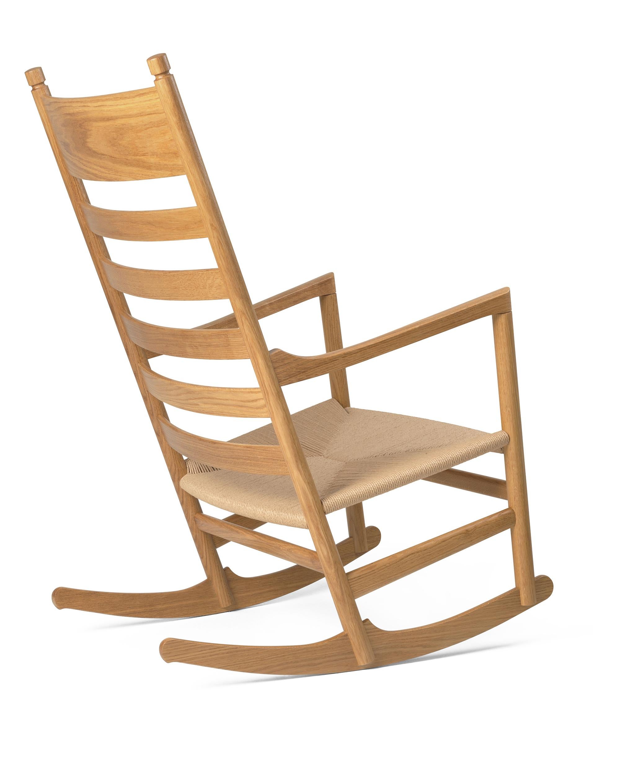 Hans J. Wegner 'CH45' Rocking Chair for Carl Hansen & Son in Oak Lacquer.

The story of Danish Modern begins in 1908 when Carl Hansen opened his first workshop. His firm commitment to beauty, comfort, refinement, and craftsmanship is evident in