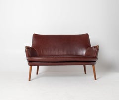 Divano Hans J. Wegner CH72 in pelle color sangue di bue, design danese, 1952