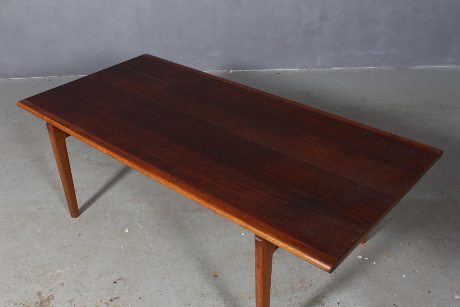 Hans J. Wegner coffee table, partly solid smoked oak.

Model GE-15, made by GETAMA, Denmark.