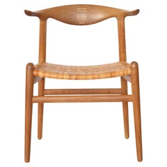 Hans J. Wegner 'Cow horn chair' in oak and cane for Johannes Hansen