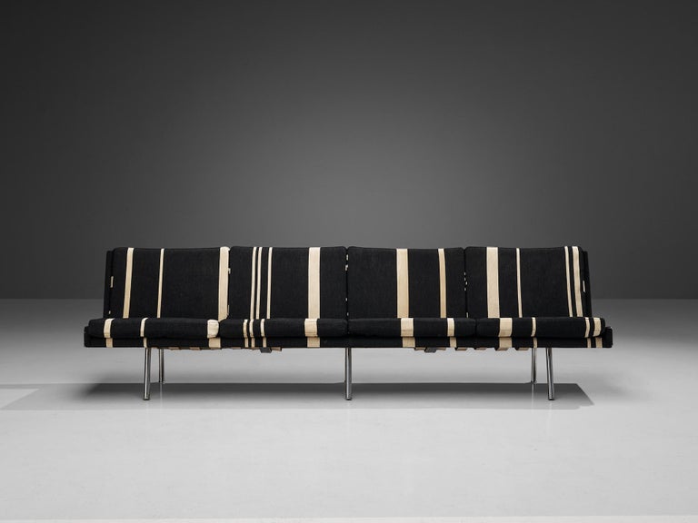 Hans J. Wegner for A.P. Stolen, sofa ‘Airport’ model AP35/4, fabric, metal, Denmark, designed in 1957 

This sleek looking sofa is part of the ‘airport’ series and is characterized by a solid construction based on sharp lines and geometrical shapes