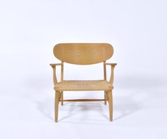 Hans J. Wegner Danish Modern Lounge Chair Model CH22 in Oak and Woven Paper Cord