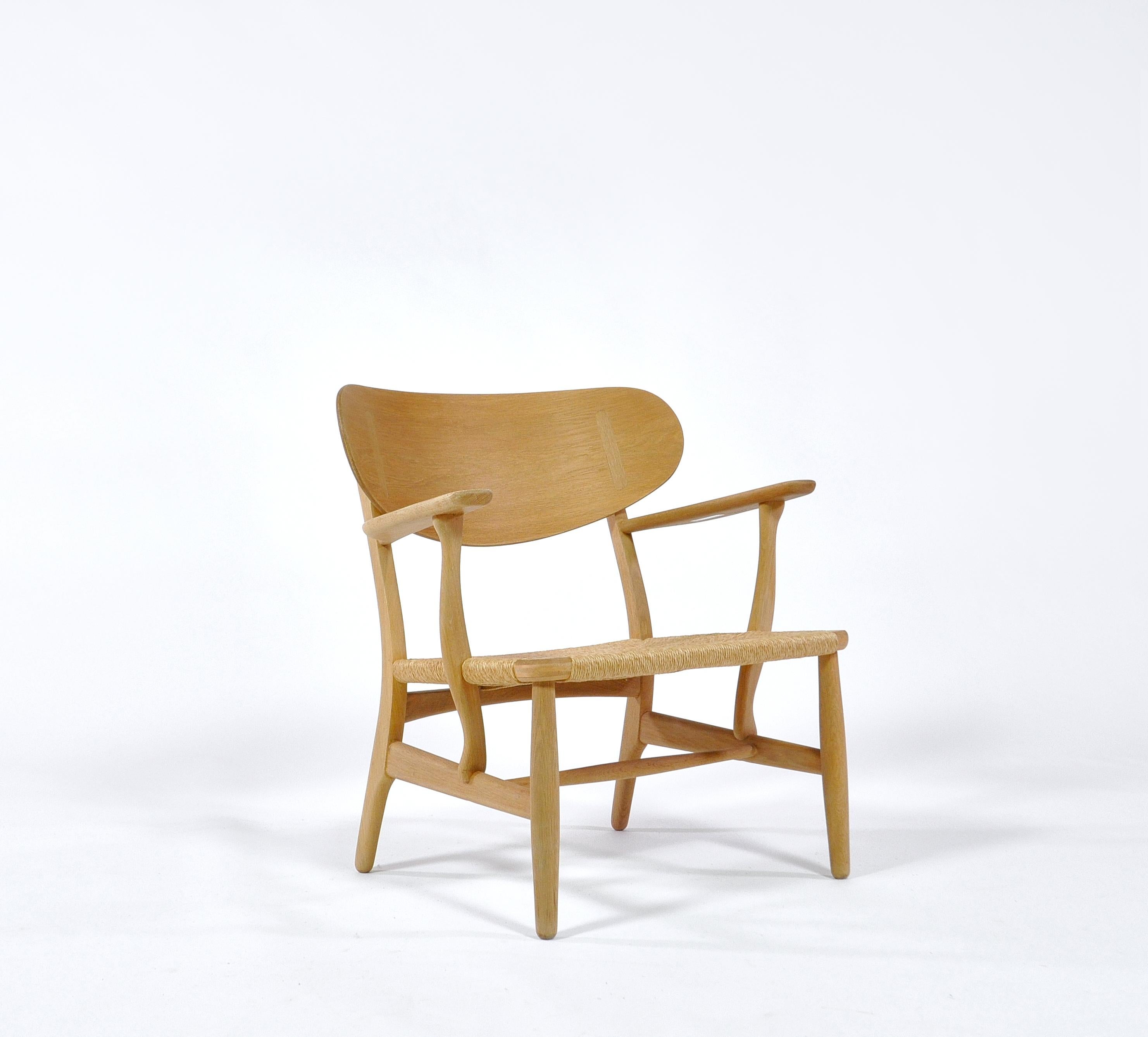 Scandinavian Modern Hans J. Wegner Danish Modern Lounge Chair Model CH22 in Oak and Woven Paper Cord