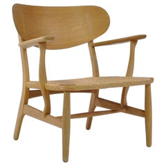 Hans J. Wegner Danish Modern Lounge Chair Model CH22 in Oak and Woven Paper Cord
