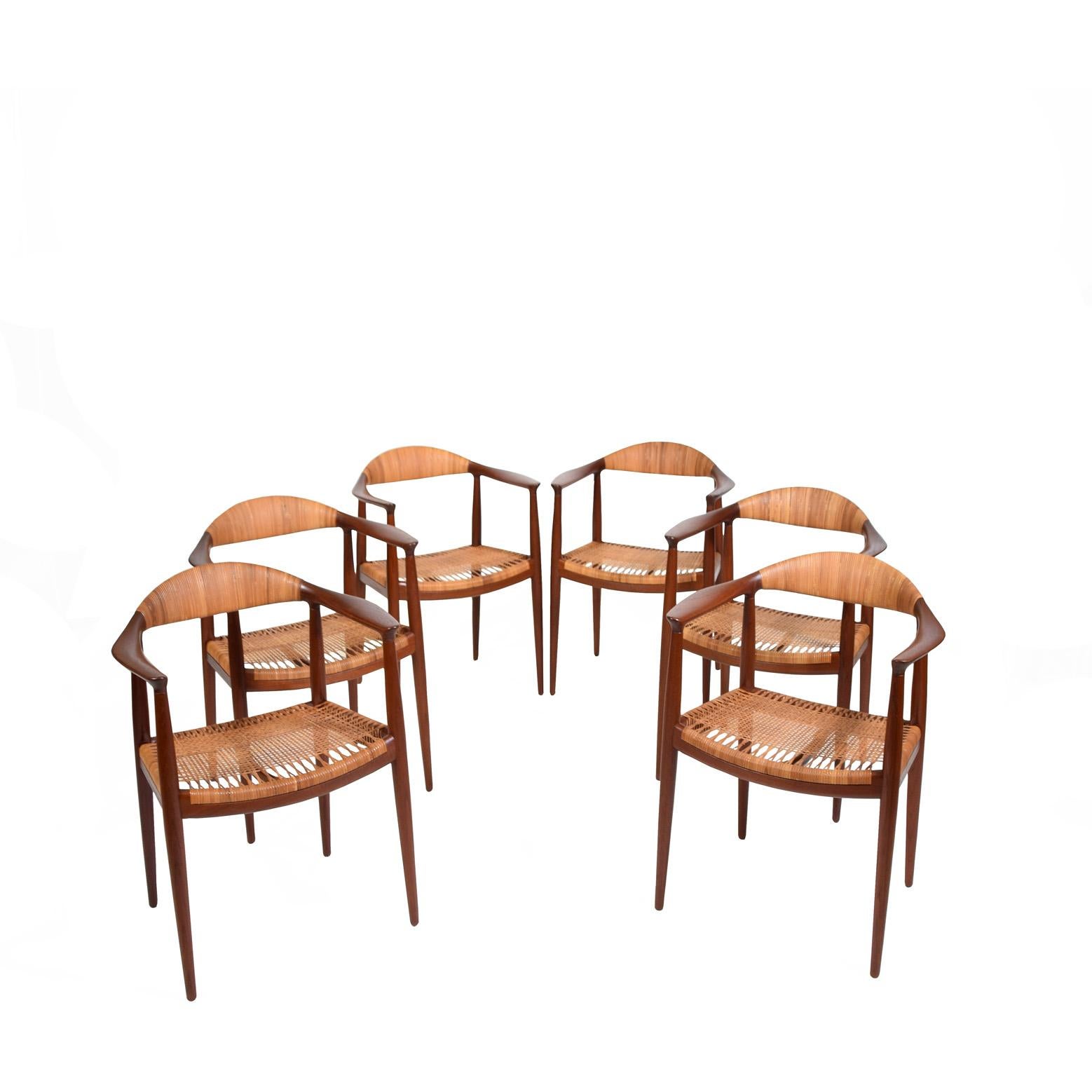 Original set table and chairs was purchased together in late 1950;’s Hans J. Wegner classic chairs solid teak JH501 table JH570 teak top oak base made by cabinetmaker Johannes Hansen.