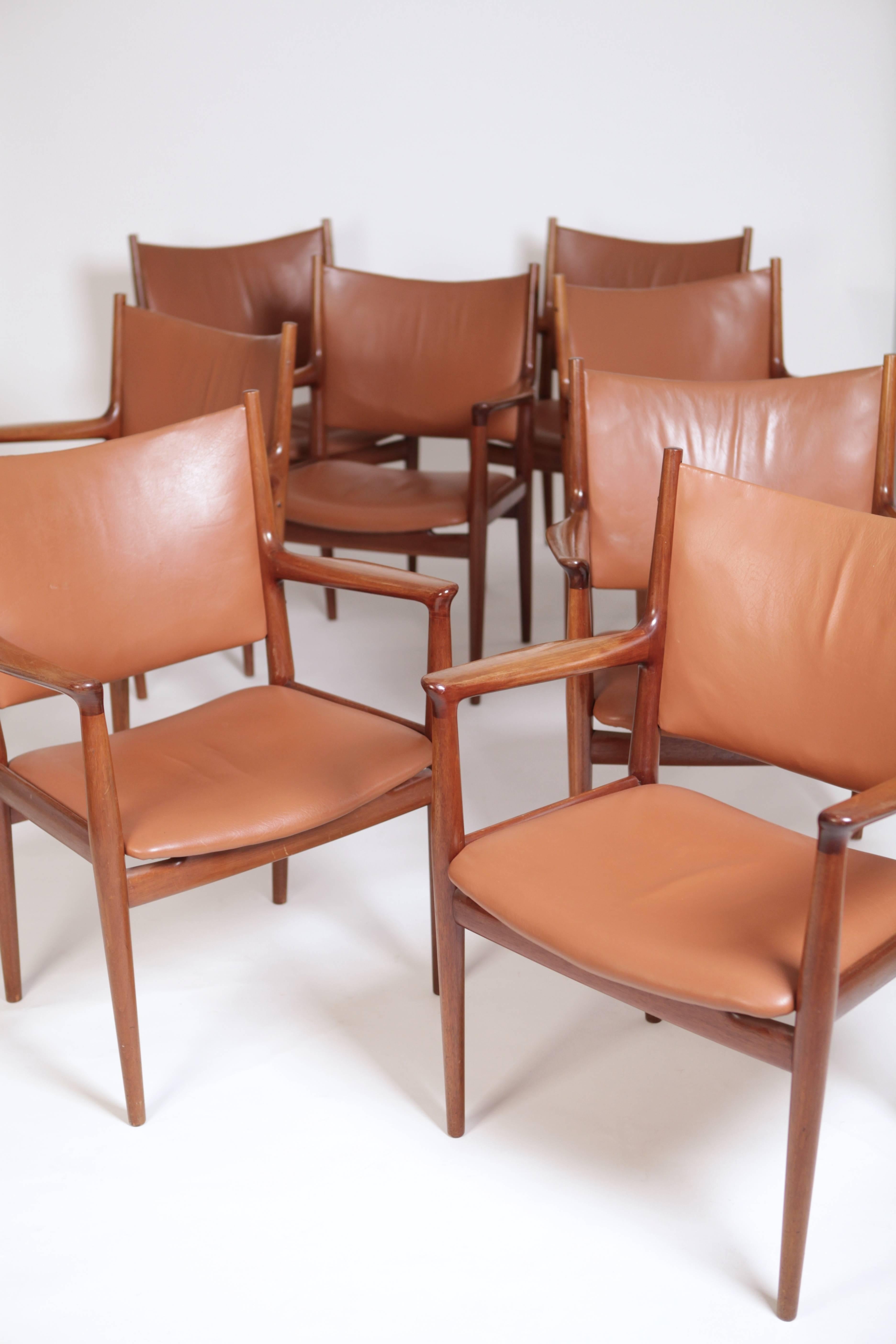 A set of eight Hans Wegner JH513 armchairs in solid mahogany and leather.
Executed by cabinet maker Johannes Hansen in Copenhagen.
Each chair signed to the underside.
