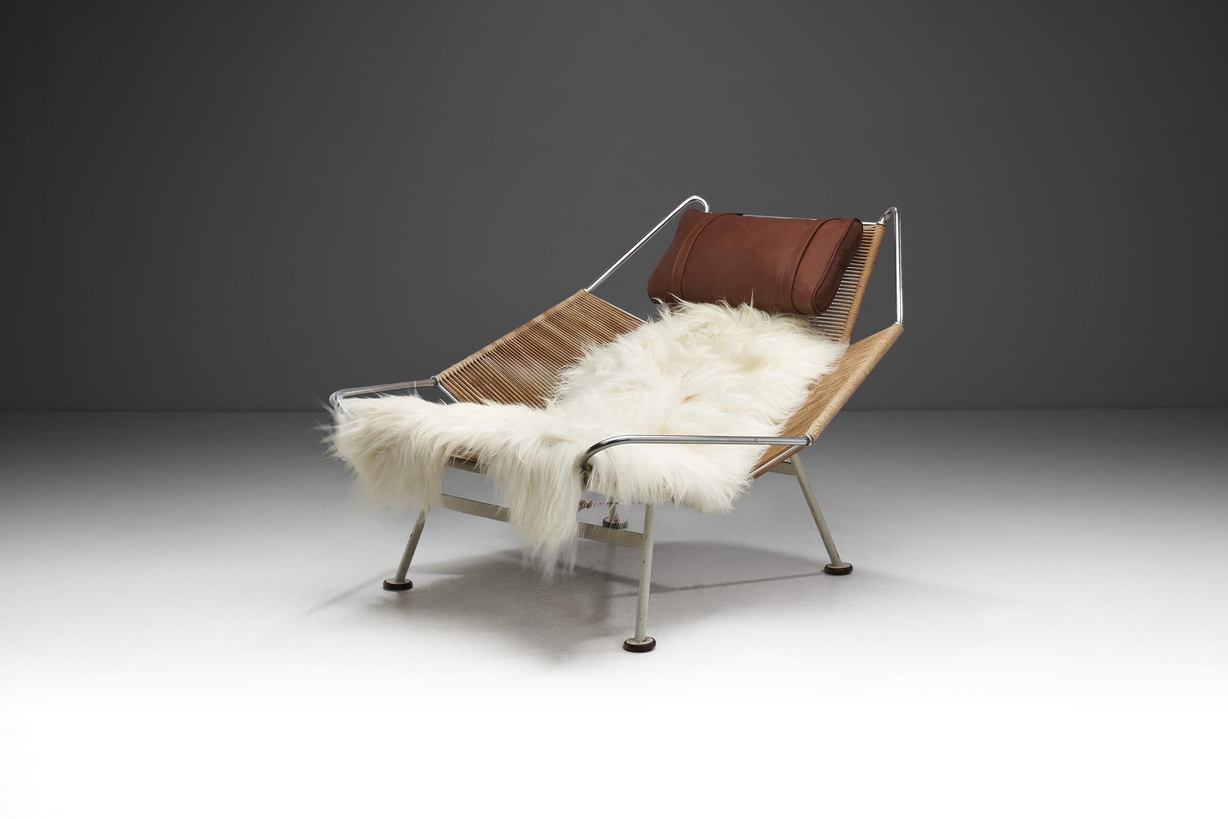 When this iconic model was released in 1950, the unusual combination of rope, white-varnished steel and sheepskin had never been seen before in the furniture industry. It was a way for Hans Wegner to demonstrate his ability to design innovative,