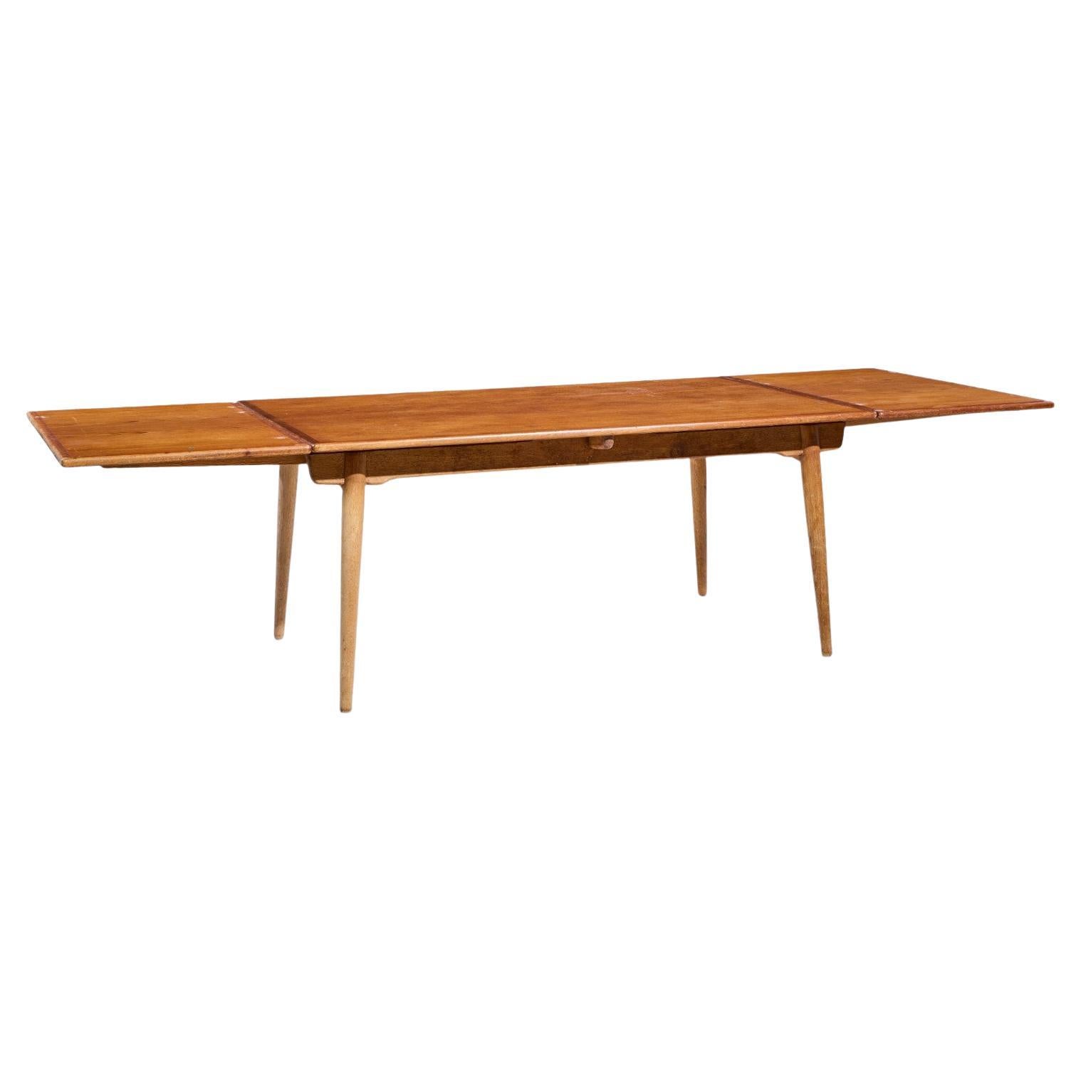 Hans J. Wegner for Andreas Tuck AT-312 Danish Teak Hidden Leaf Dining Table