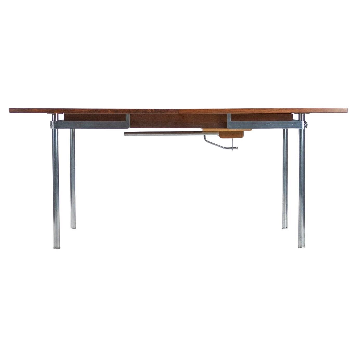 Hans J. Wegner for Andreas Tuck Model AT321 Dining Table in Rosewood and Chrome For Sale