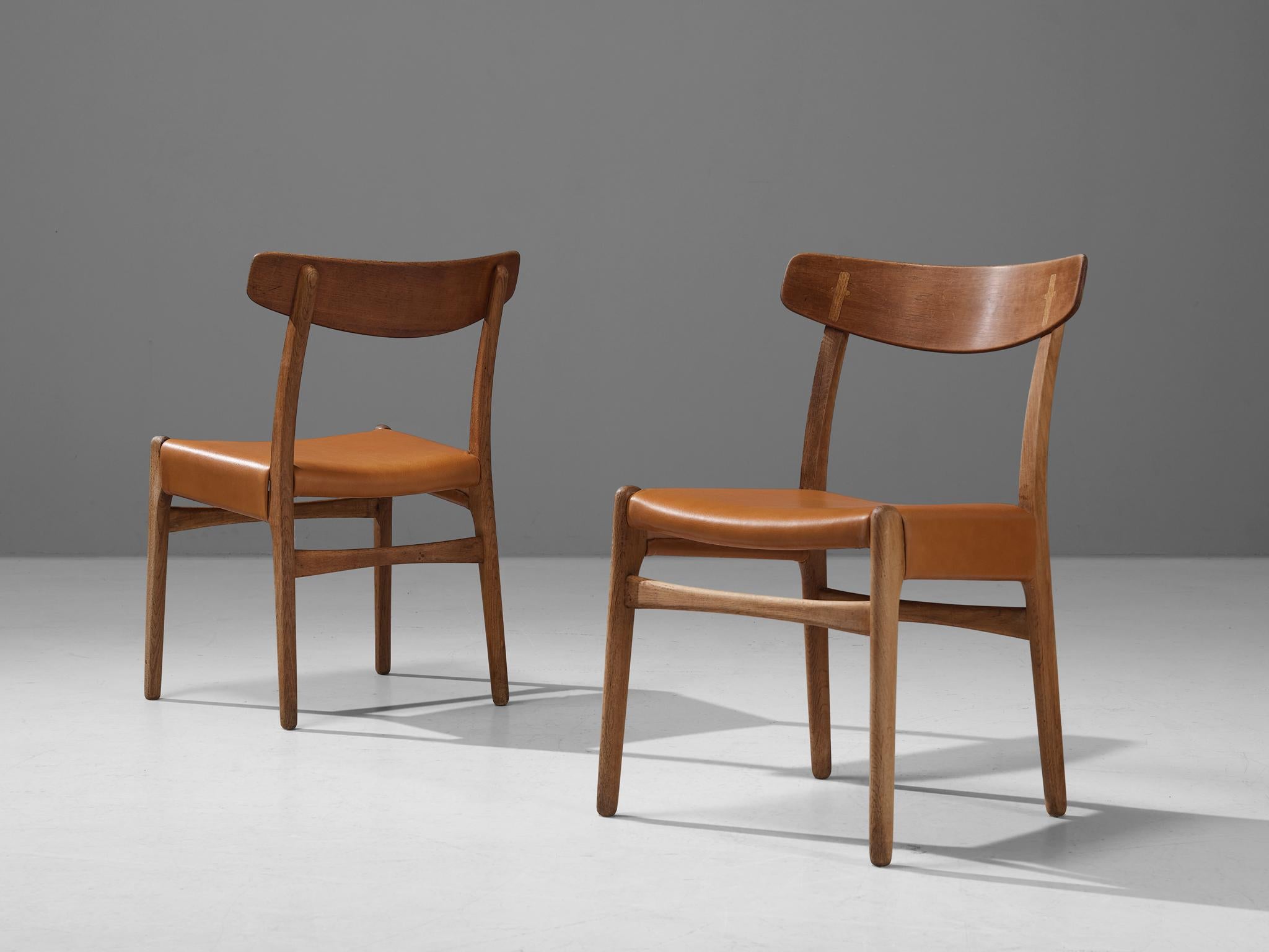 Danish Hans J. Wegner for Carl Hansen Pair of Dining Chairs in Cognac Leather and Oak