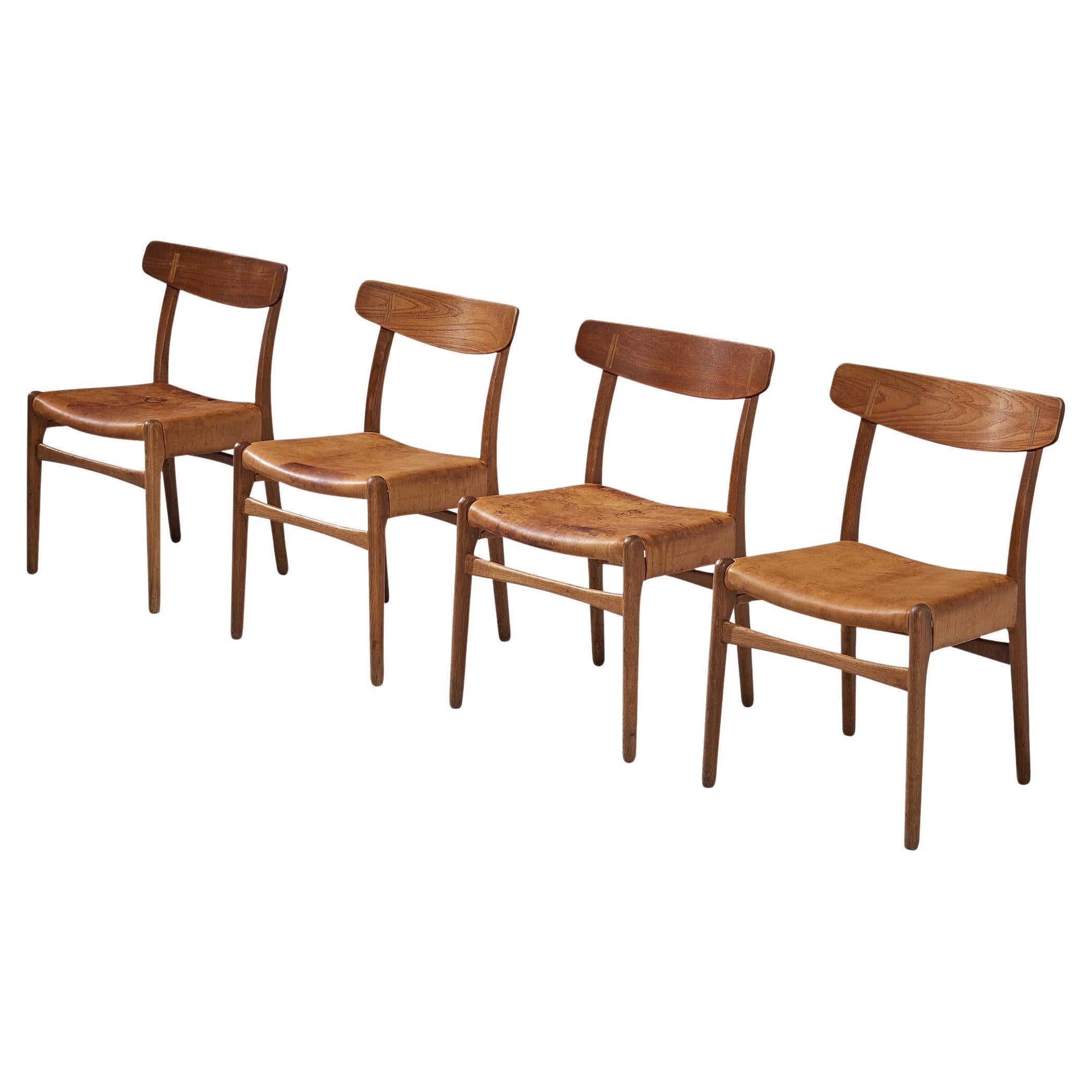 Hans J. Wegner para Carl Hansen Juego de cuatro sillas de cuero coñac y roble  en venta