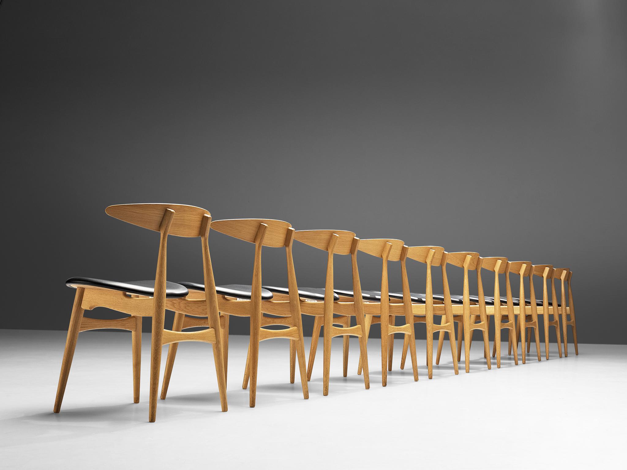 Mid-20th Century Hans J. Wegner for Carl Hansen & Søn Set of Ten Dining Chairs in Oak and Leather