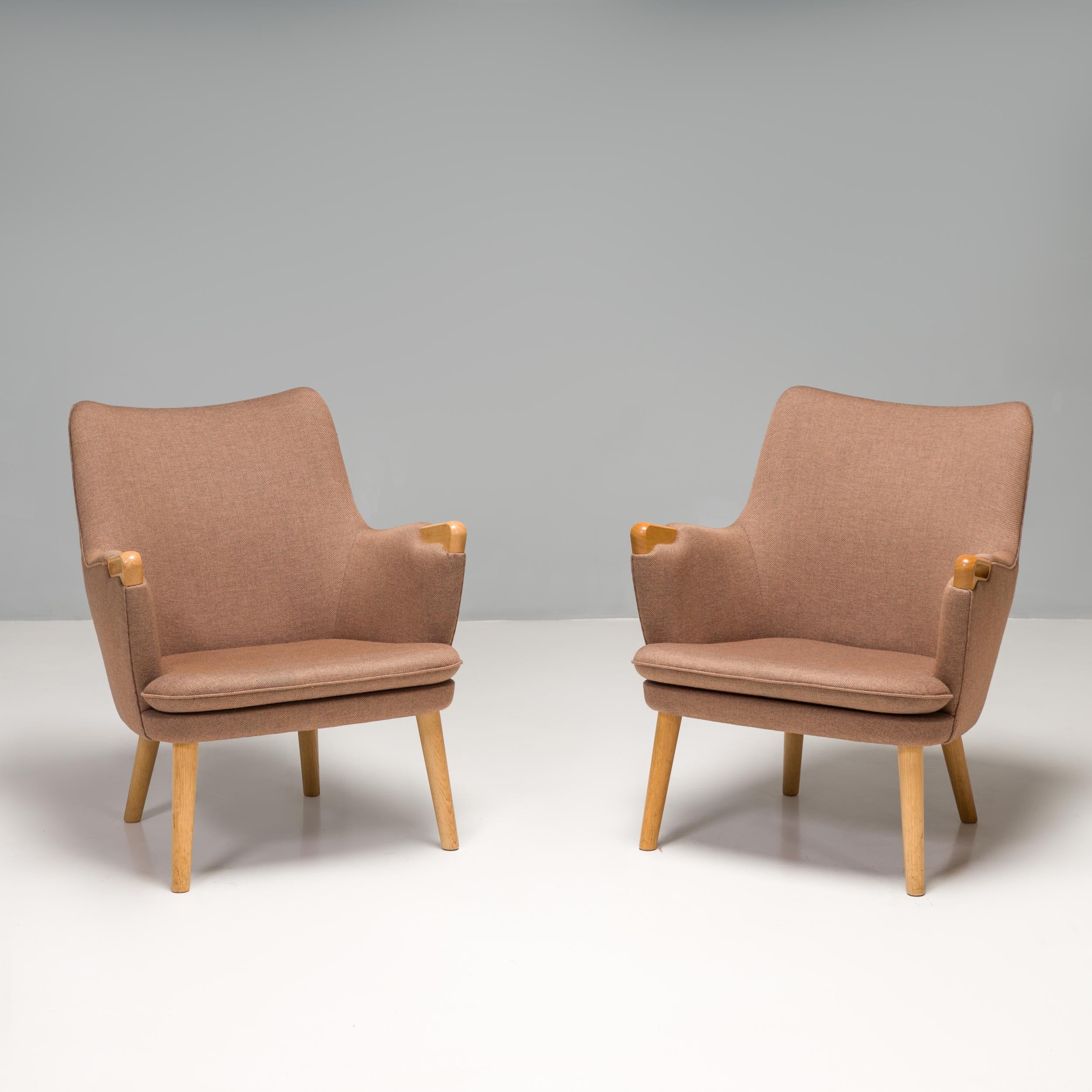 Originally designed by Hans J. Wegner in 1952 for the Magasin du Nord store in Copenhagen, the CH71 armchair is manufactured by Carl Hansen & Son and is a fantastic example of mid century Scandinavian design.

Combining both upholstery with