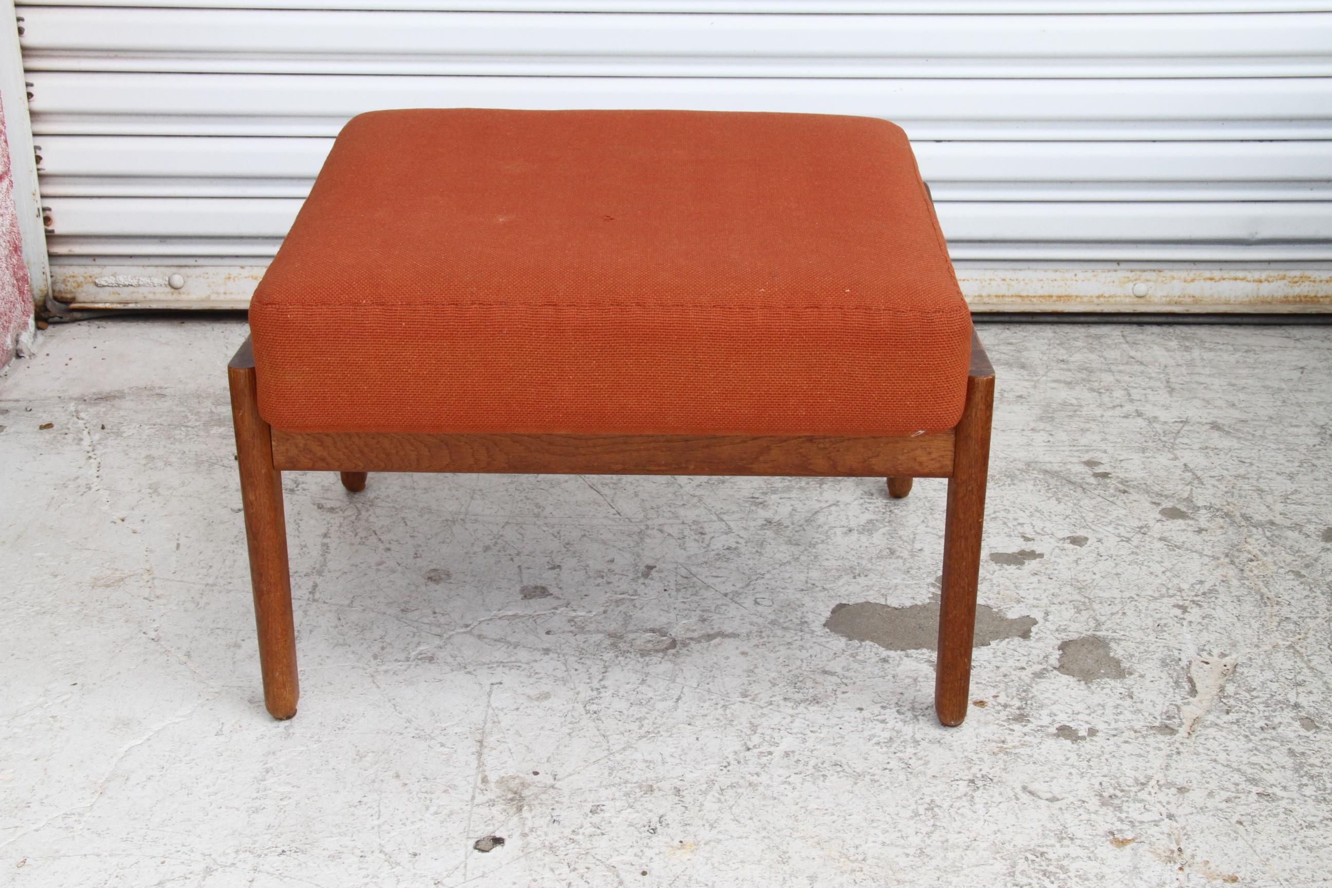 Hans J. Wegner for Getama, 'Cigar' ottoman, model 'GE290', oak, fabric, Denmark, design 1955 Designed in 1955, this Cigar ottoman is a creation by Danish master Hans J. Wegner for Getama. Simple in line, this design features an open framework in oak