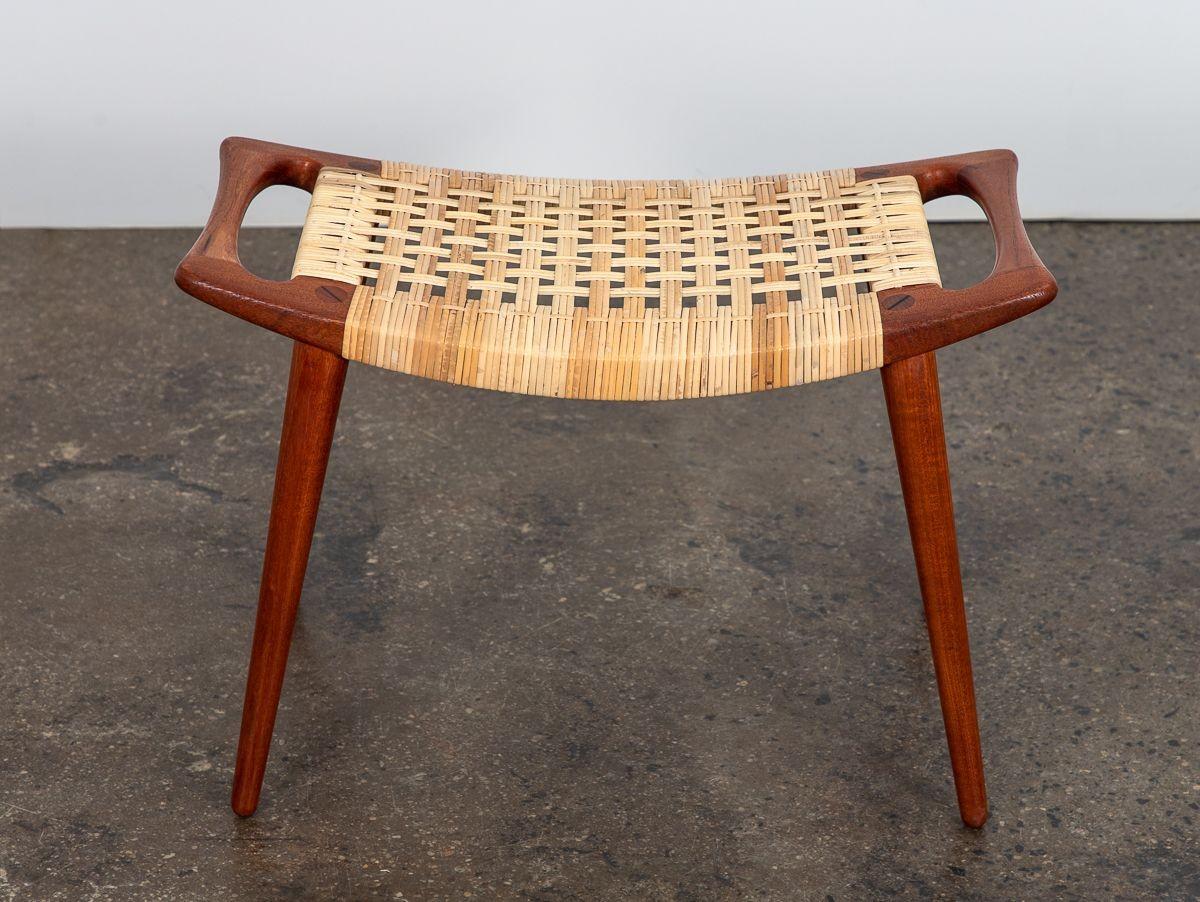 A seldom seen model JH 539 footstol, designed by Hans Wegner for Johannes Hansen. Elegantly crafted teak frame, with woven cane seat. A fantastic companion to our Papa Bear Chair. Denmark, 1950s.
27.5