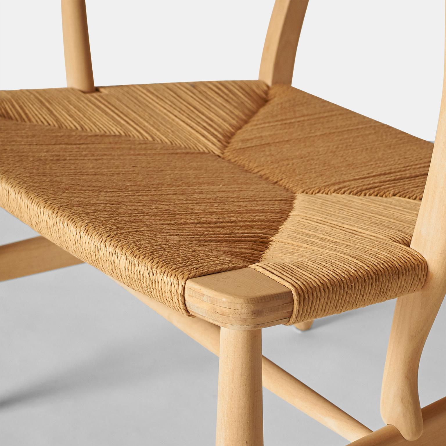 A freshly renovated easy chair by Hans J Wegner. Soap treated beech frame and new papercord seat. Model CH-22, produced by Carl Hansen and Son.