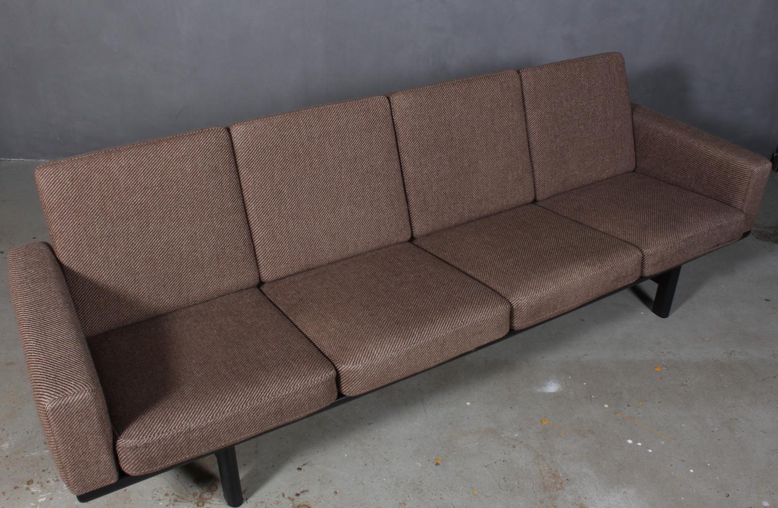 Hans J. Wegner four-seat sofa upholstered with fabric.

Original Epeda cushions.

Frame in solid dark tanned oak.

Model 236/4, produced by GETAMA.
