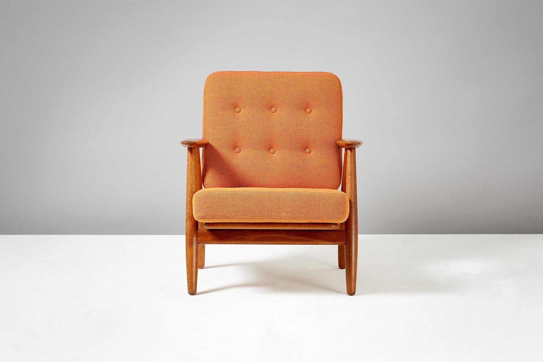 Hans J. Wegner

GE-240 'Cigar' chair, 1955

Produced by GETAMA, Gedsted, Denmark. Oak frame with original sprung cushions reupholstered in orange Kvadrat Hallingdal wool fabric. Maker's brand under seat.

