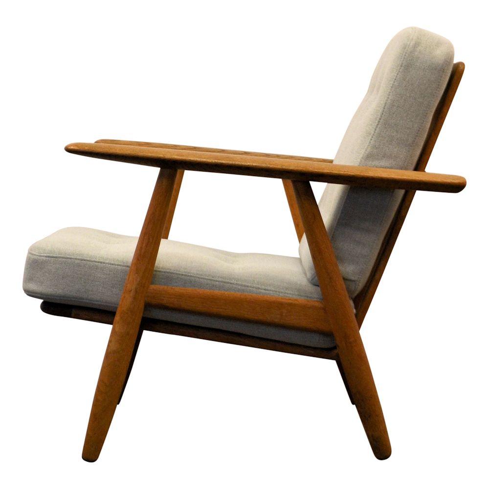 Gorgeous vintage lounge chair model GE-240 “Cigar” designed by Hans J. Wegner for GETAMA, Denmark. Wegner is widely considered to be one of the leading figures in 20th century furniture design. His furniture designs unite form and function,