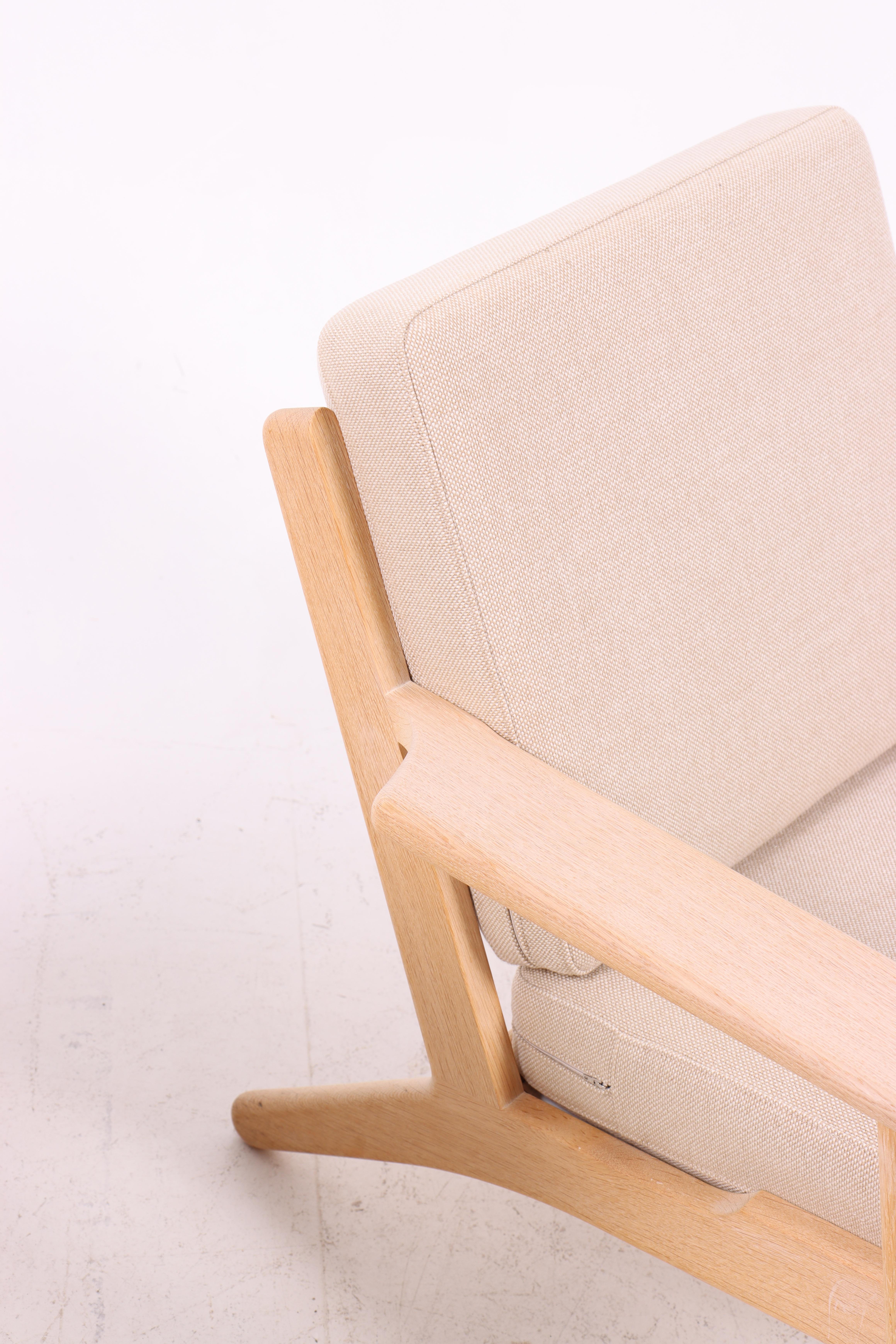 Scandinavian Modern Hans J. Wegner GE290 Lounge Chairs in Oak with Wool Cushions, Getama, 1970s For Sale