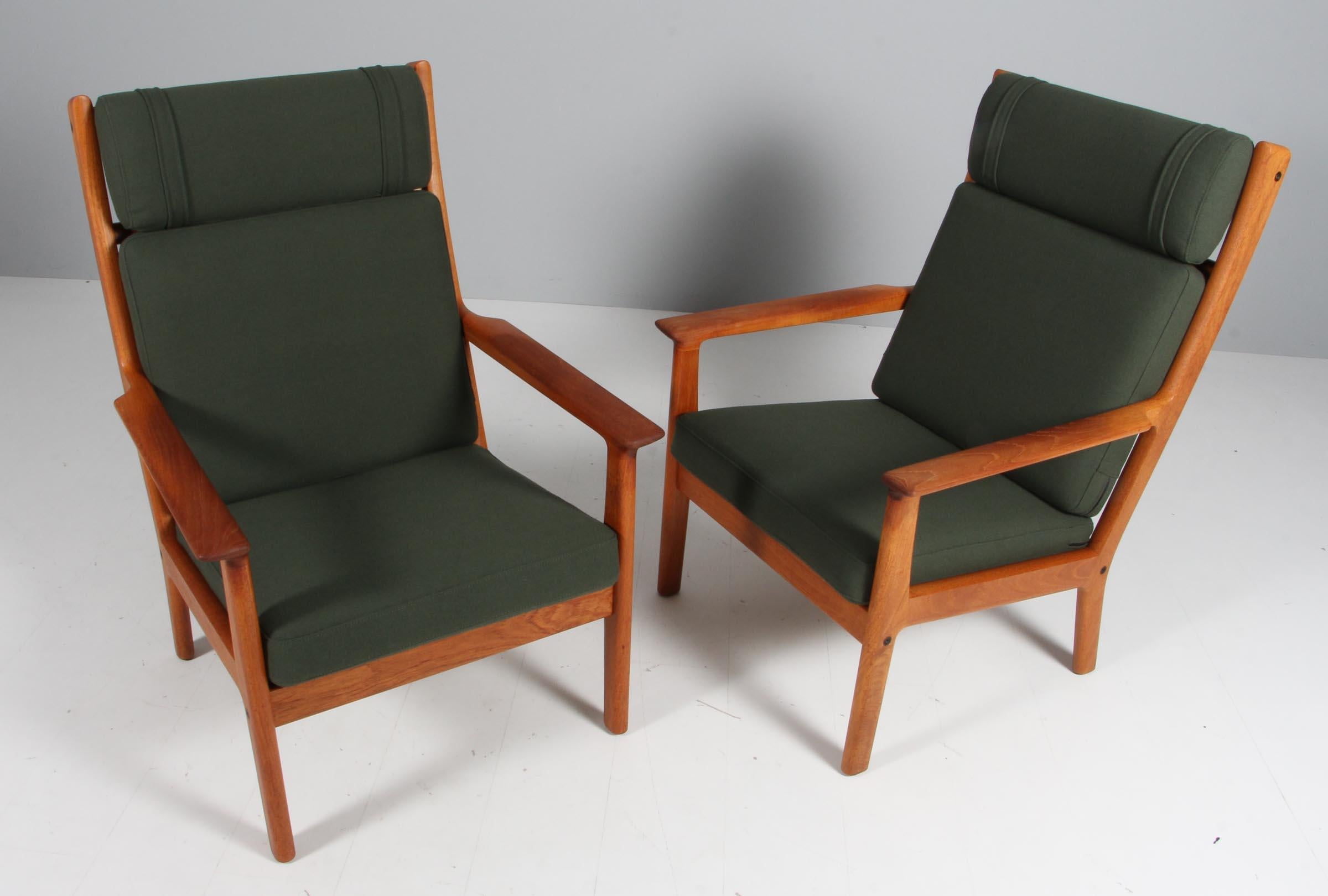 Hans J. Wegner highback lounge chair in solid teak. 

New upholstered with Hallingdal wool from Kvadrat.

Model GE265, made by Getama.