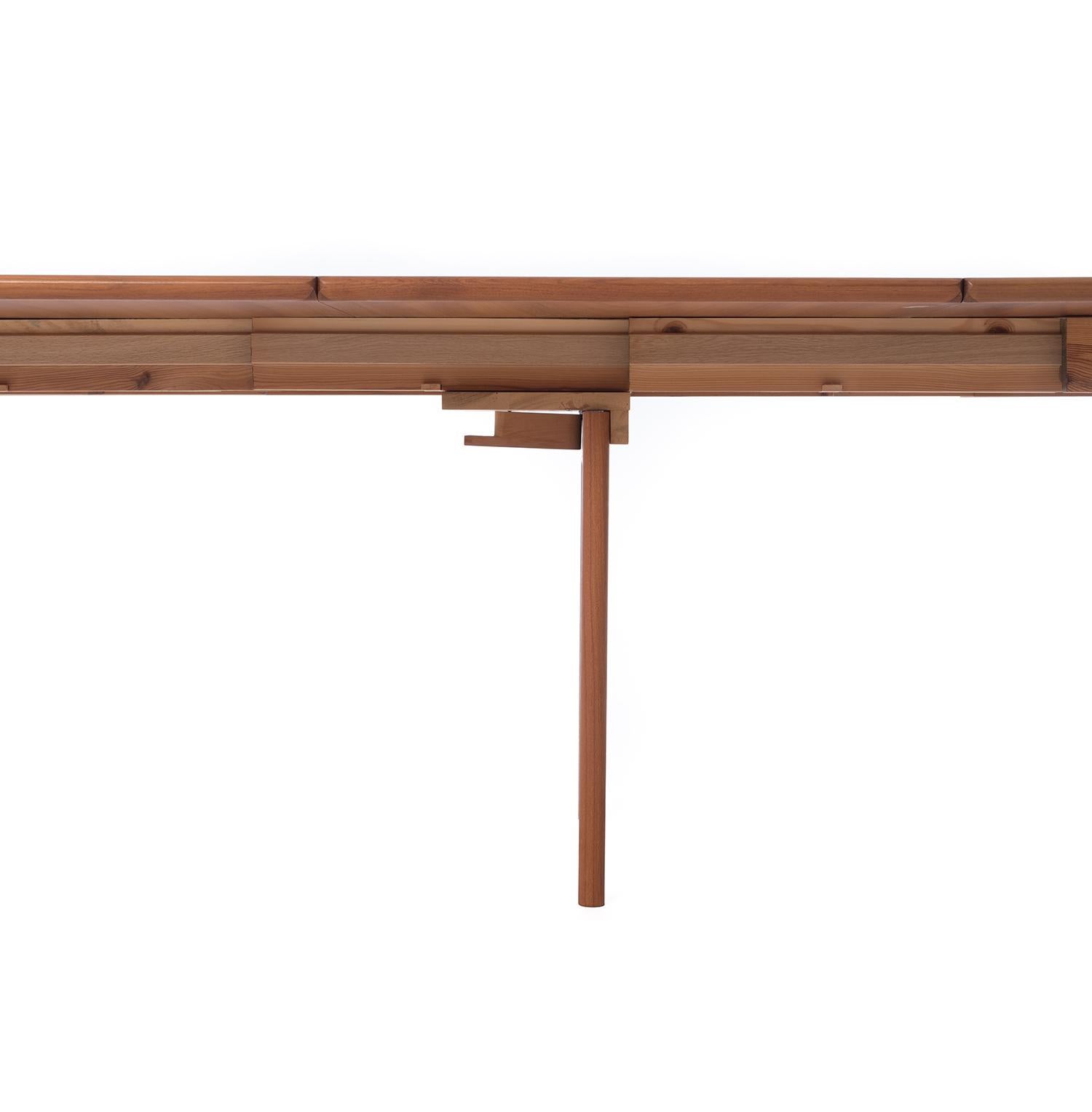 This Classic dining table made from old growth teak was designed by Hans J. Wegner and made by Johannes Hansen. Three interlocking leaves are removable, when fully extended seats 12-14 people. This table is 70.25